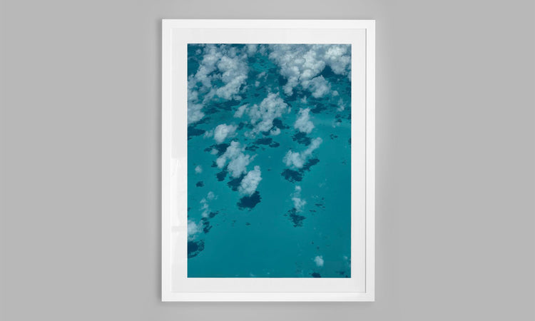 White Clouds over a Blue Sea