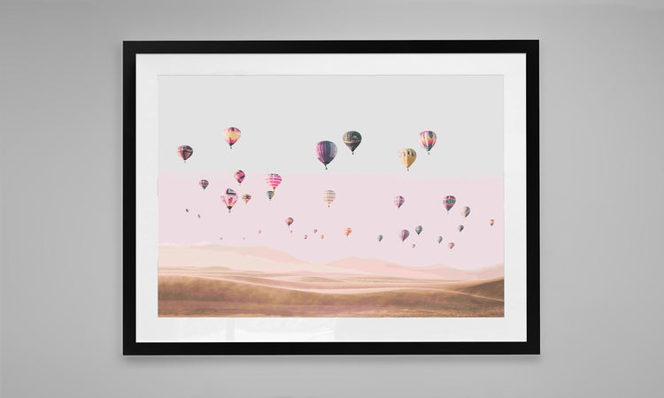 Hot Air Balloons Flying over the Desert