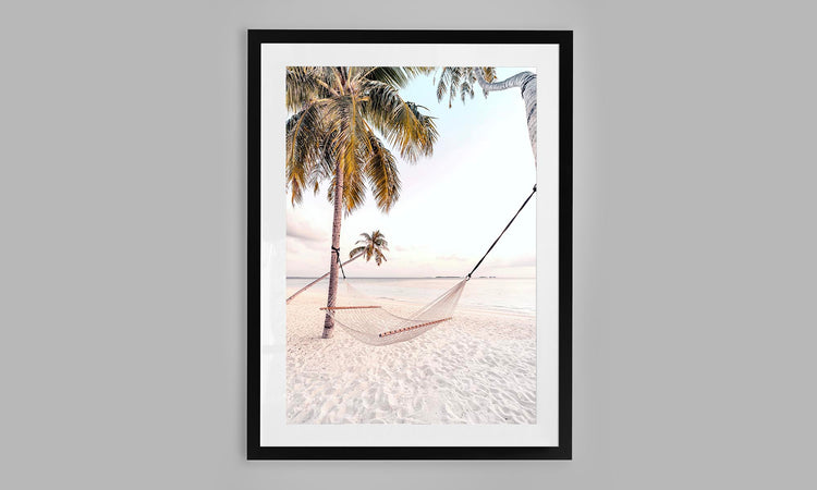 Hammock on a beach in the Maldives.