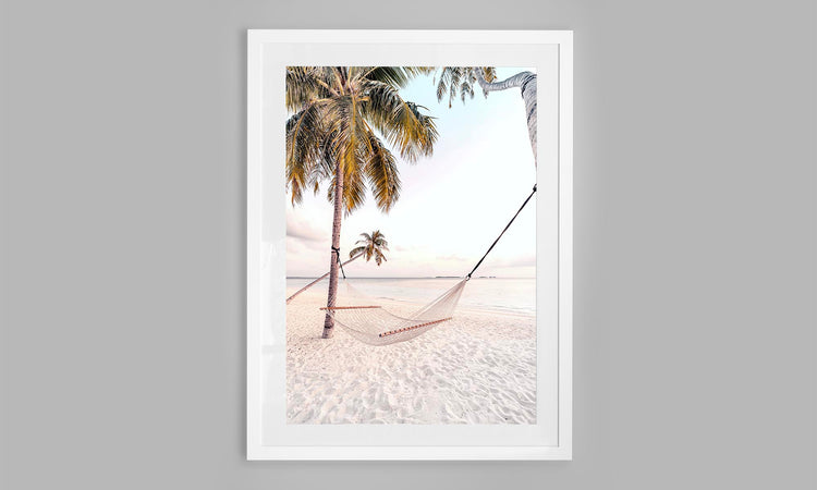 Hammock on a beach in the Maldives.