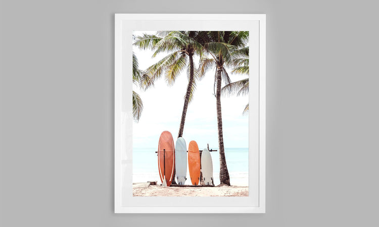 Surfboards resting against Palm Trees, Sri Lanka .