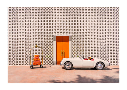 Arrival at the Parker, Palm Springs in a 1960 MG Roadster